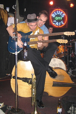 Twenty Fingers Two Necks